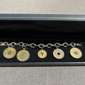 7” sterling silver bracelet with NYC Subway token charms